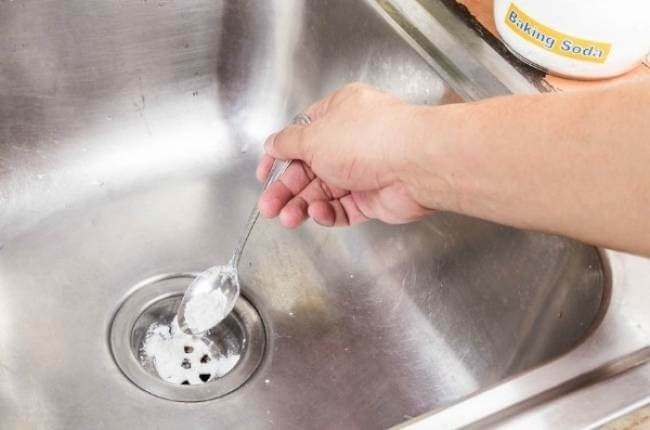 prevent kitchen sink clogging up